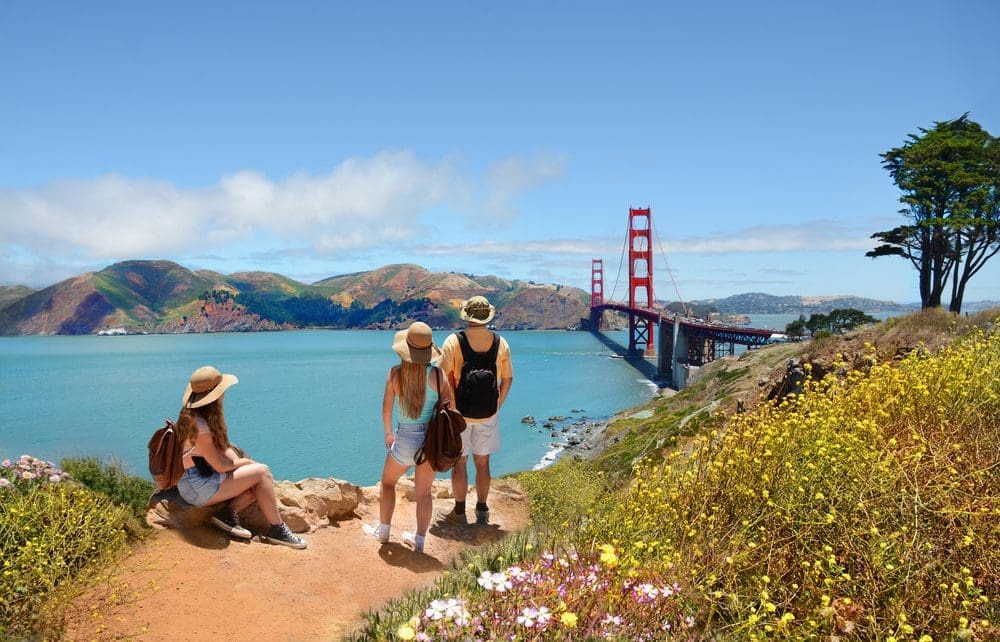 Why do tourists go to California?